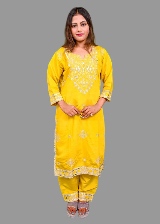 festive yellow kurti set with shimmering silver work
