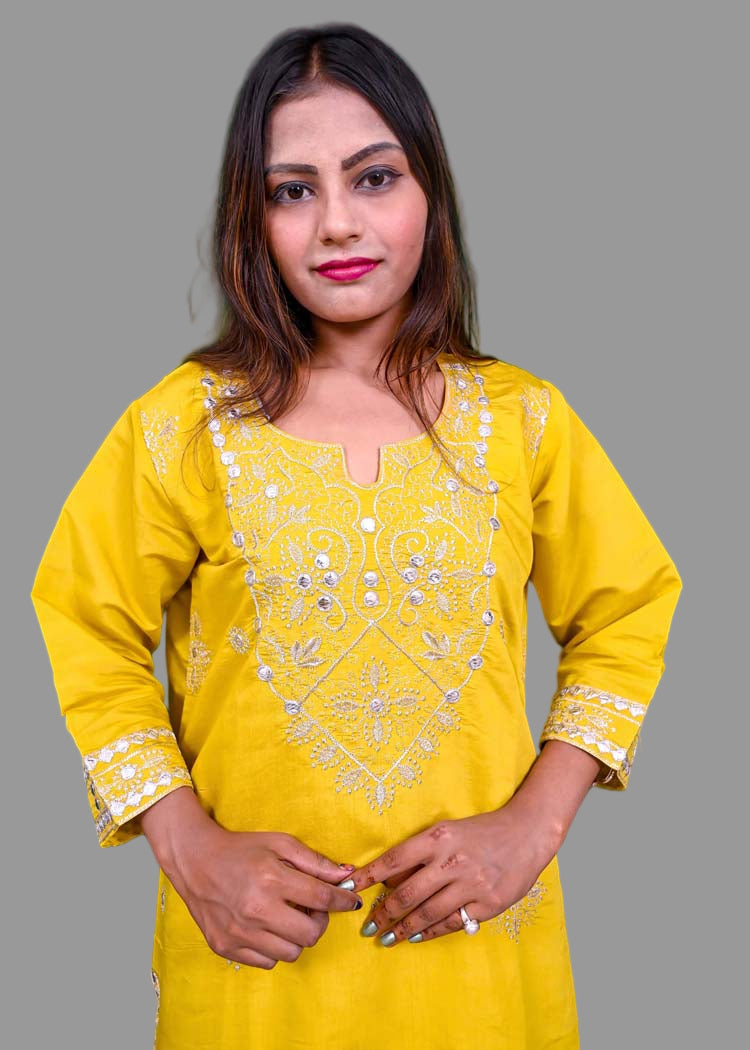 festive yellow kurti set with shimmering silver work
