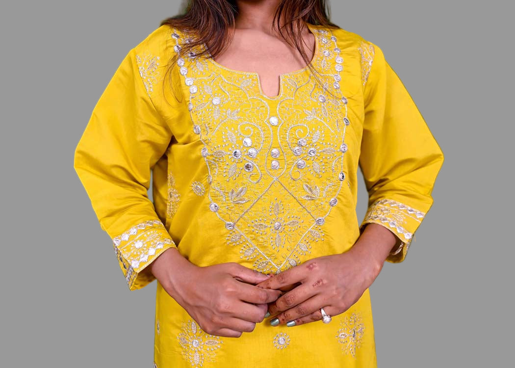 festive yellow kurti set with shimmering silver work