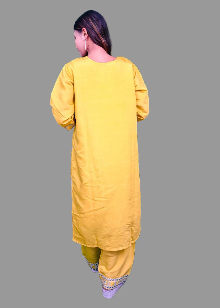 festive yellow kurti set with shimmering silver work