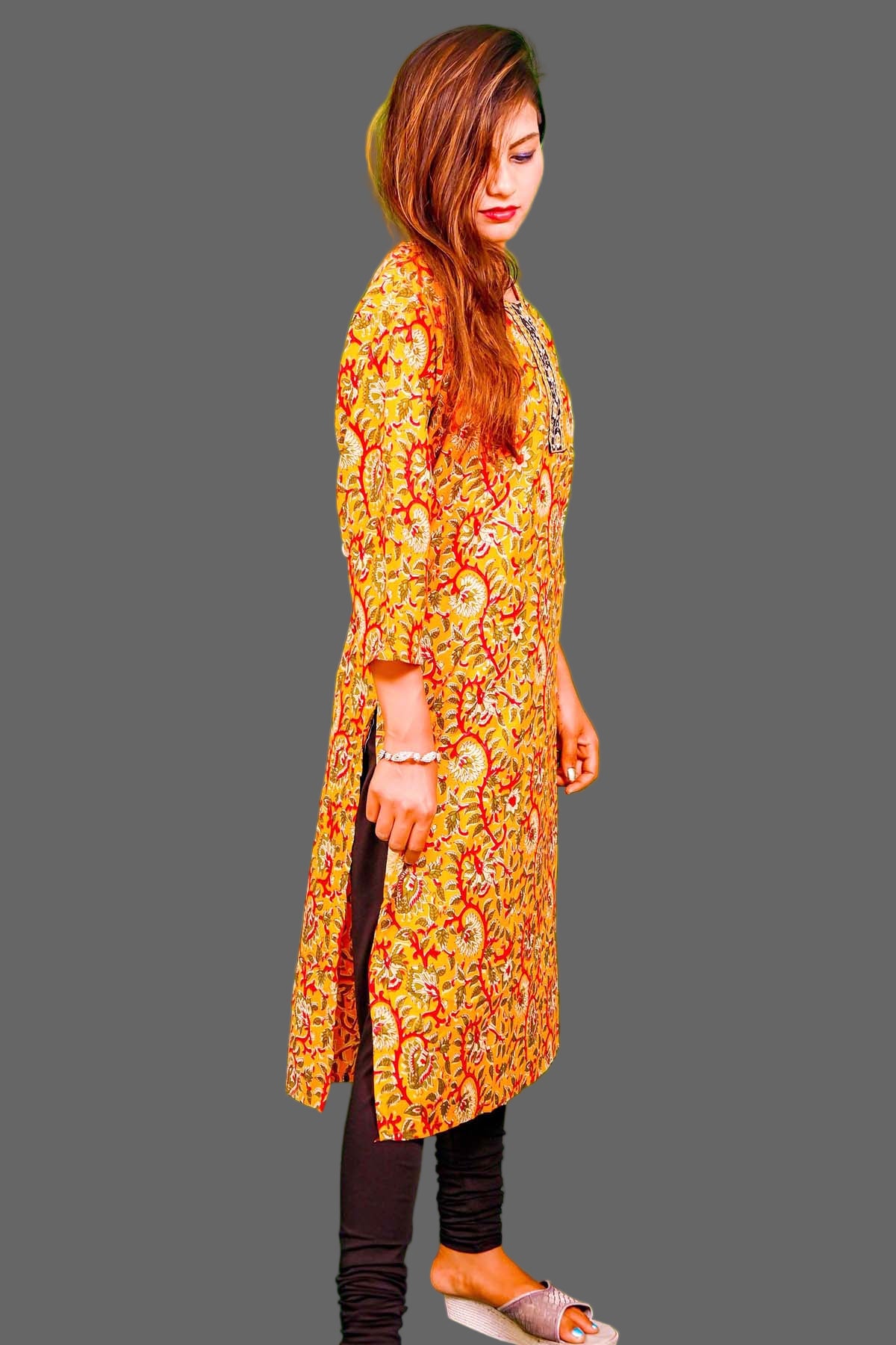 mustard yellow kurti with black embroidered neckline