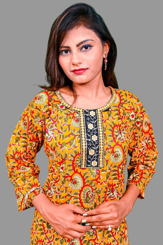 mustard yellow kurti with black embroidered neckline