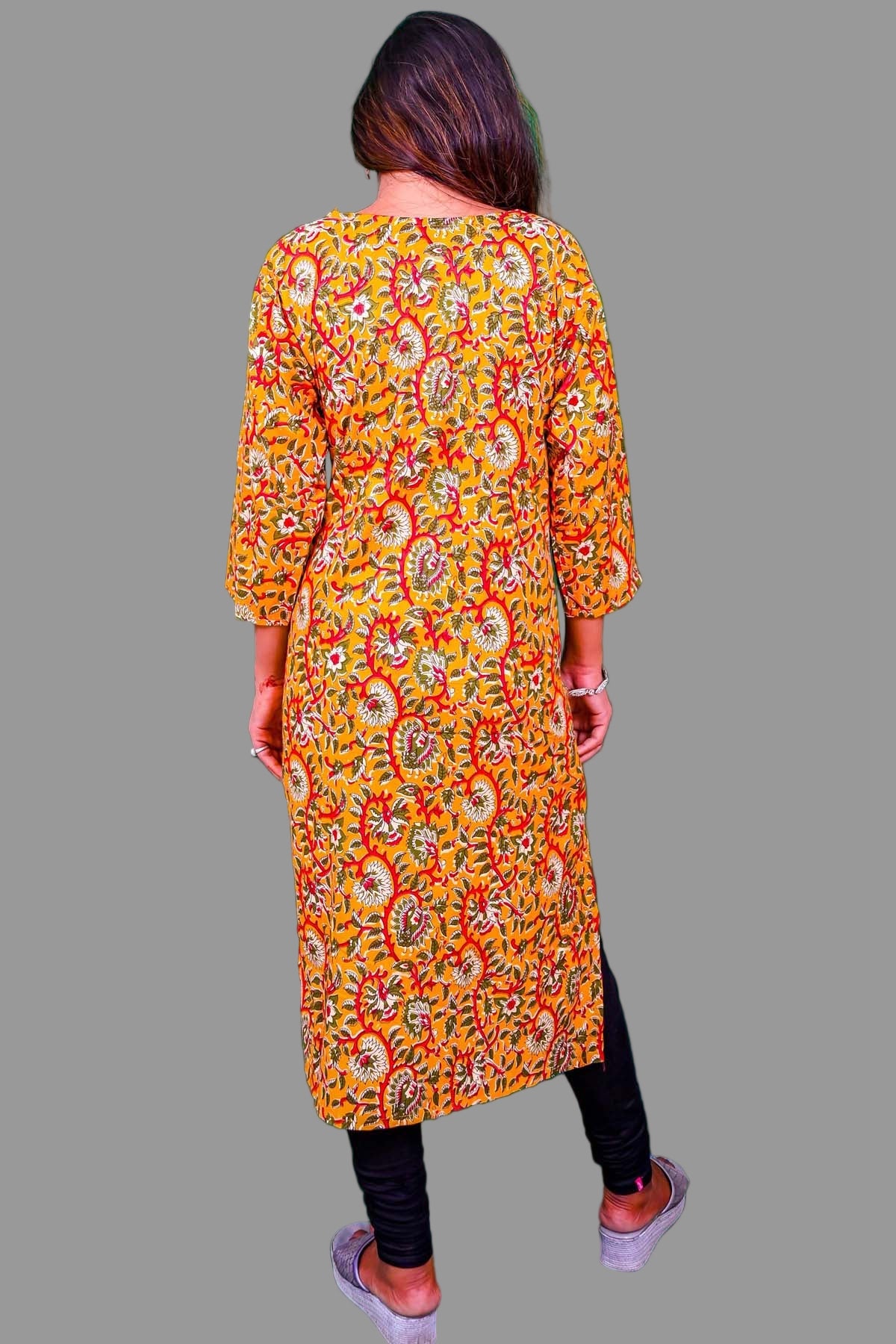 mustard yellow kurti with black embroidered neckline