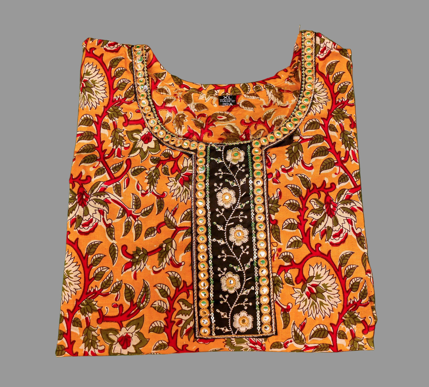 mustard yellow kurti with black embroidered neckline