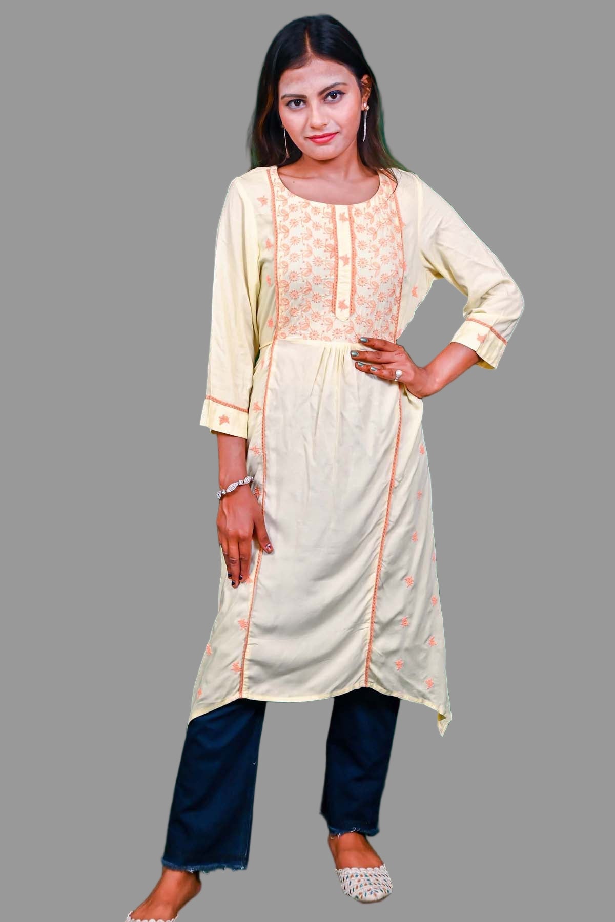 soft cream kurti with delicate peach embroidery