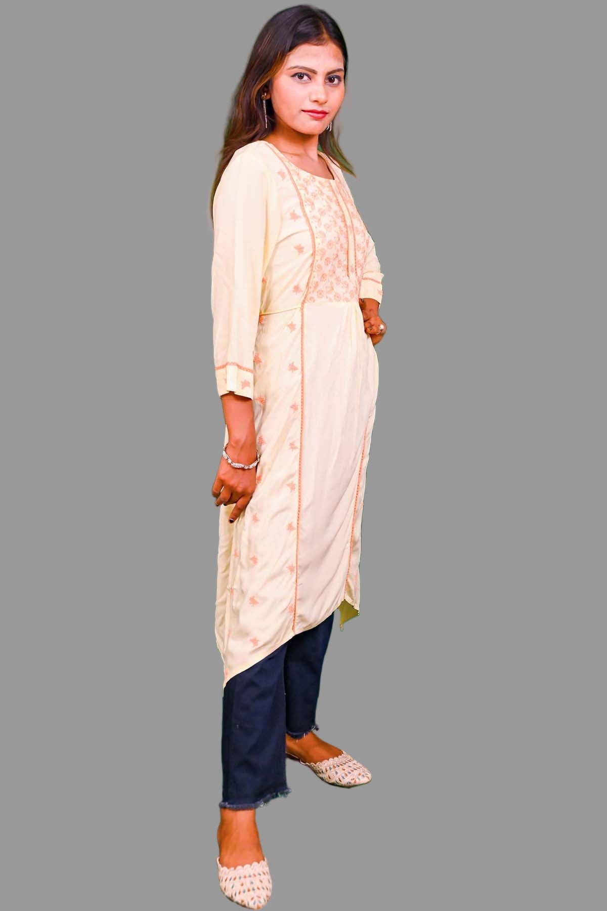 soft cream kurti with delicate peach embroidery