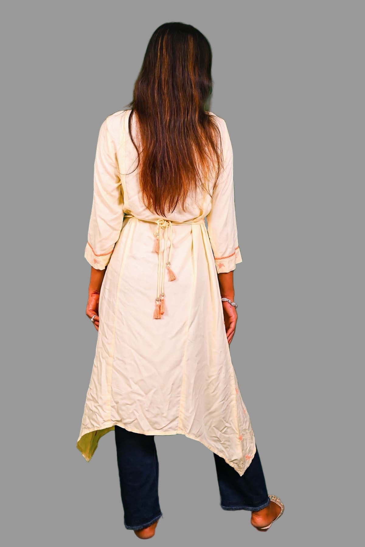 soft cream kurti with delicate peach embroidery