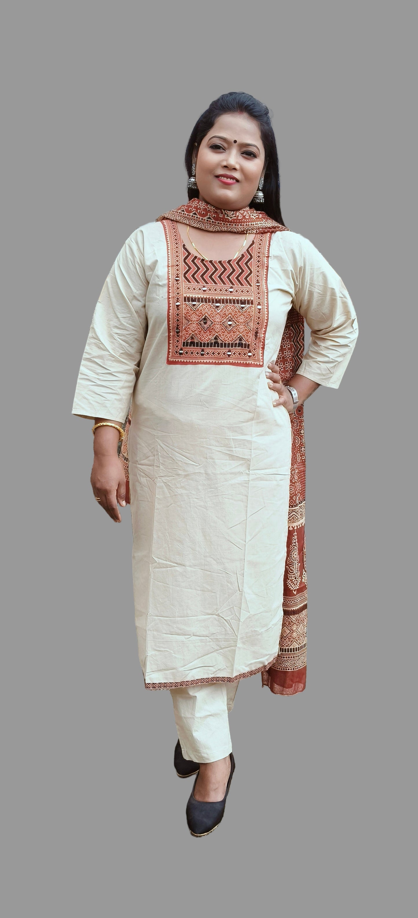 trendy beige color kurti set with rust red patch design