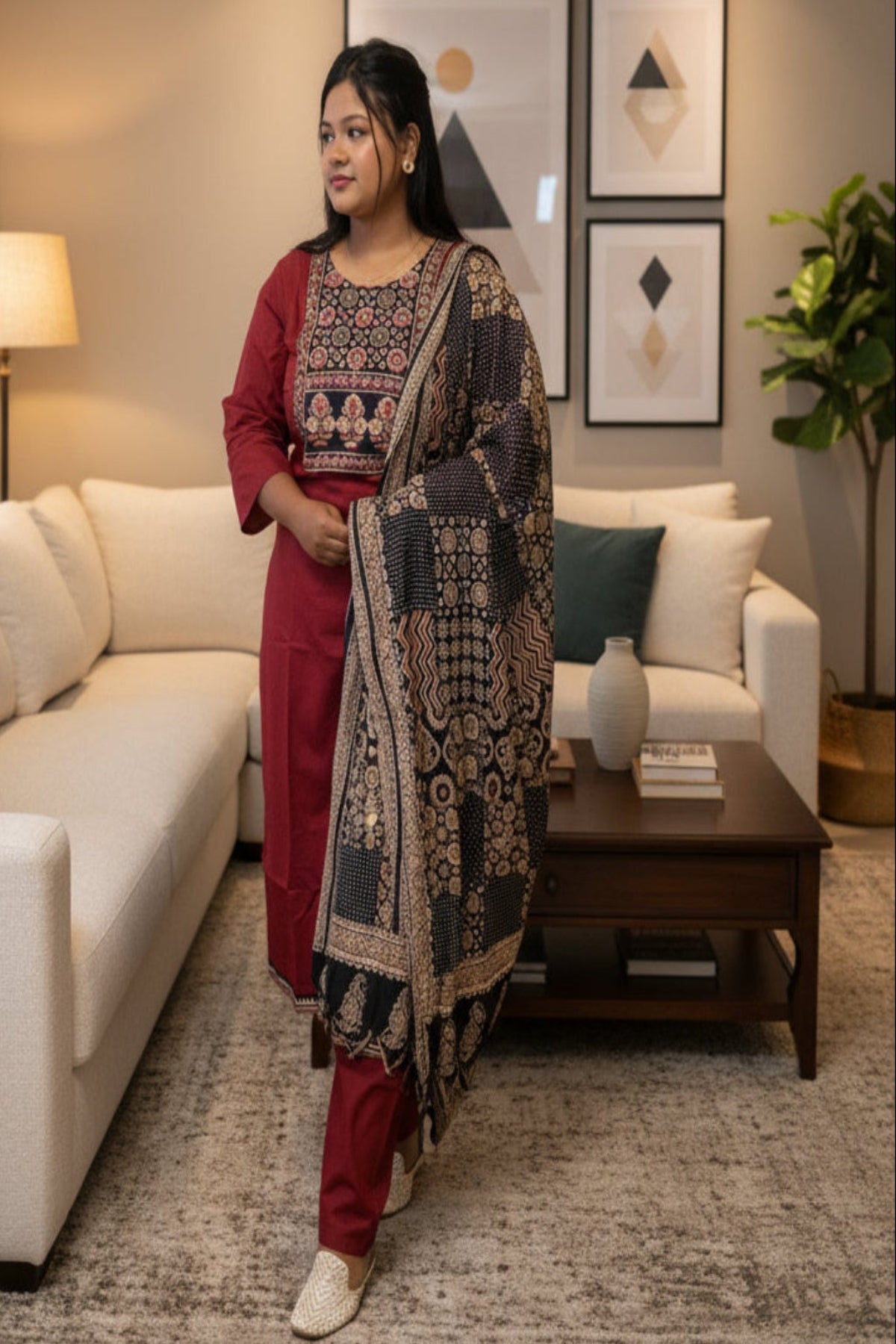 designer maroon kurti with floral motifs