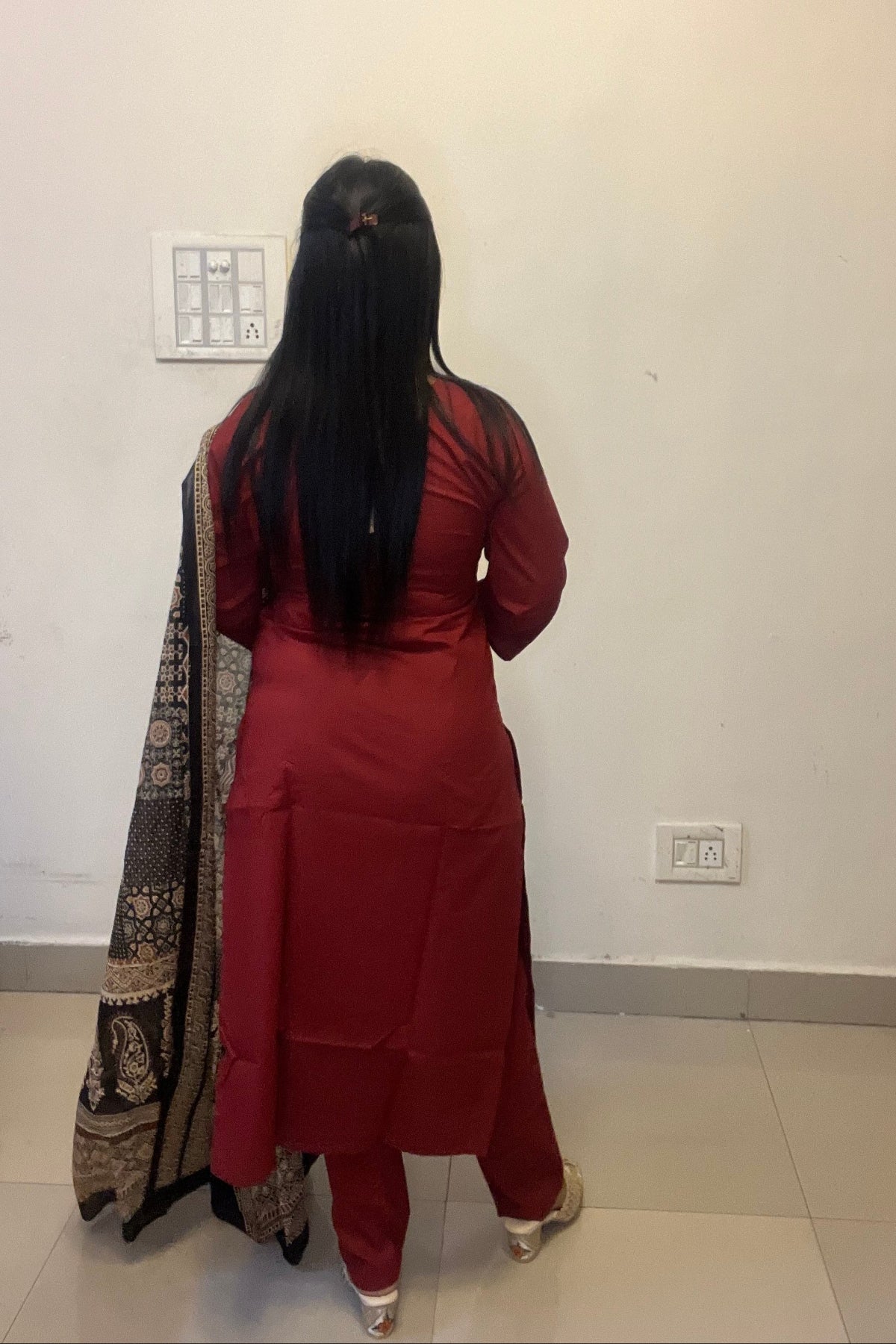 designer maroon kurti with floral motifs