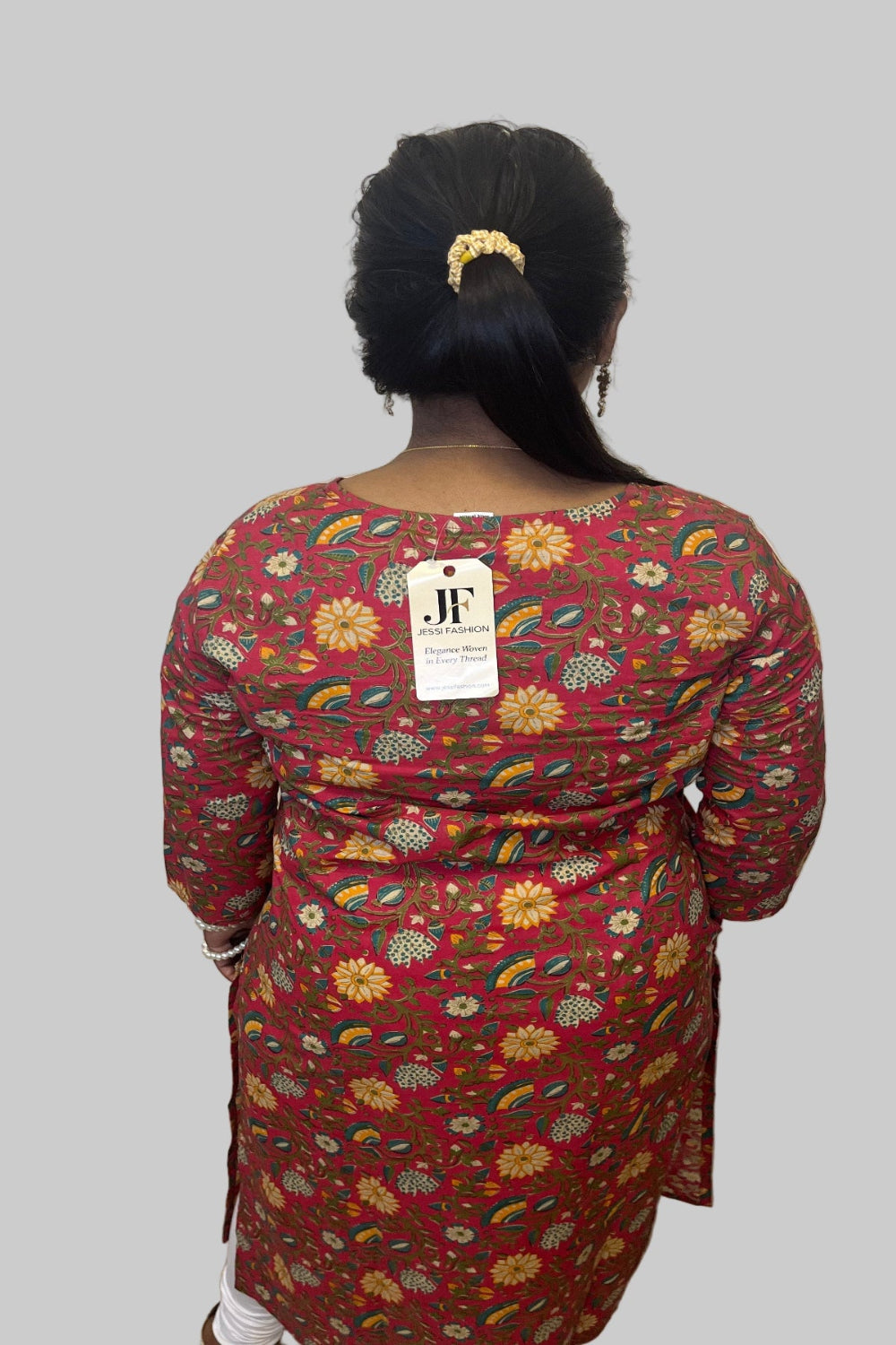 elegant maroon floral print kurti with golden detailing with pocket