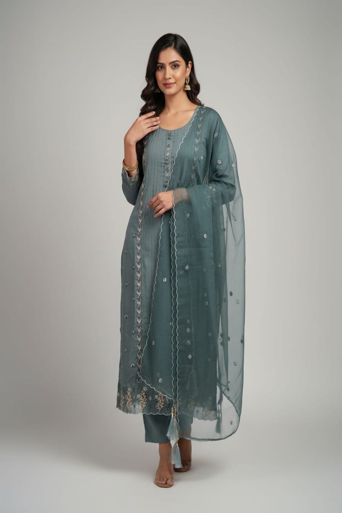 Teal green pintuck kurti with floral buttons & tread work