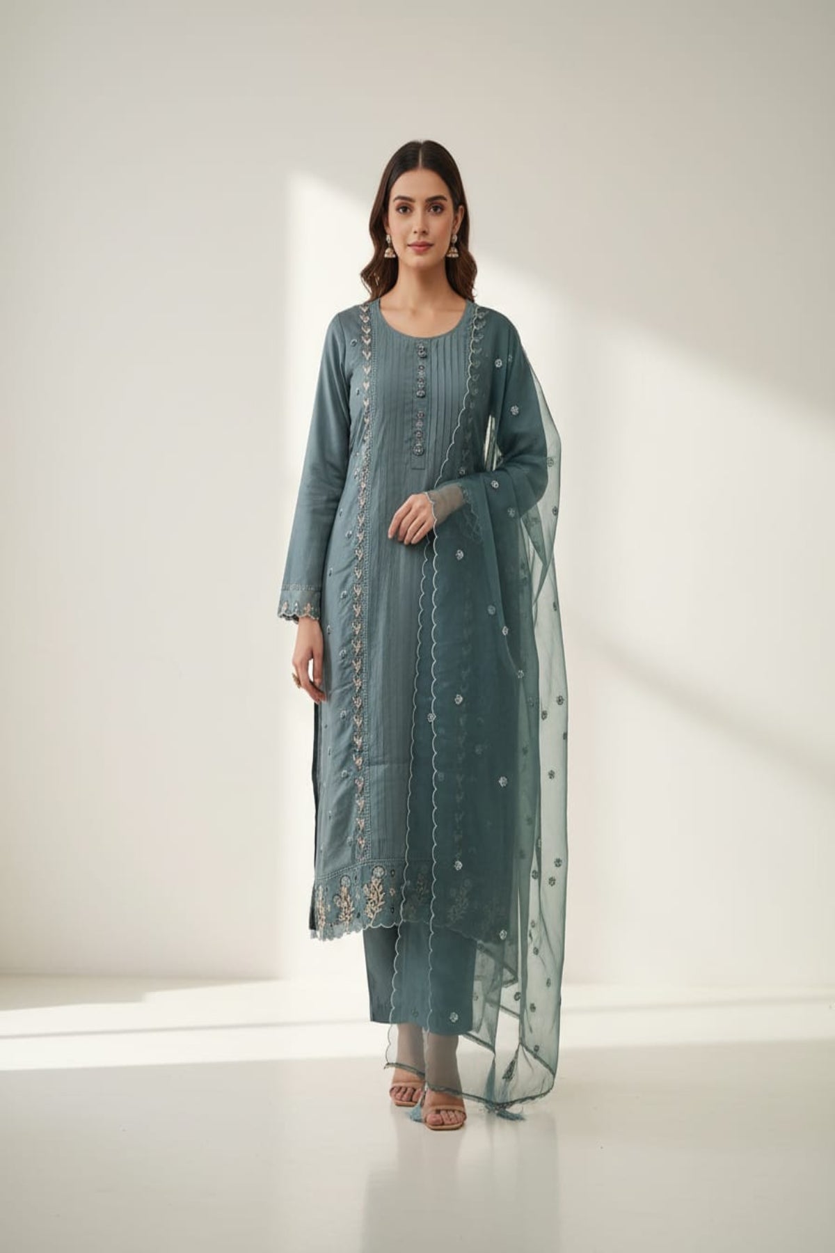 Teal green pintuck kurti with floral buttons & tread work