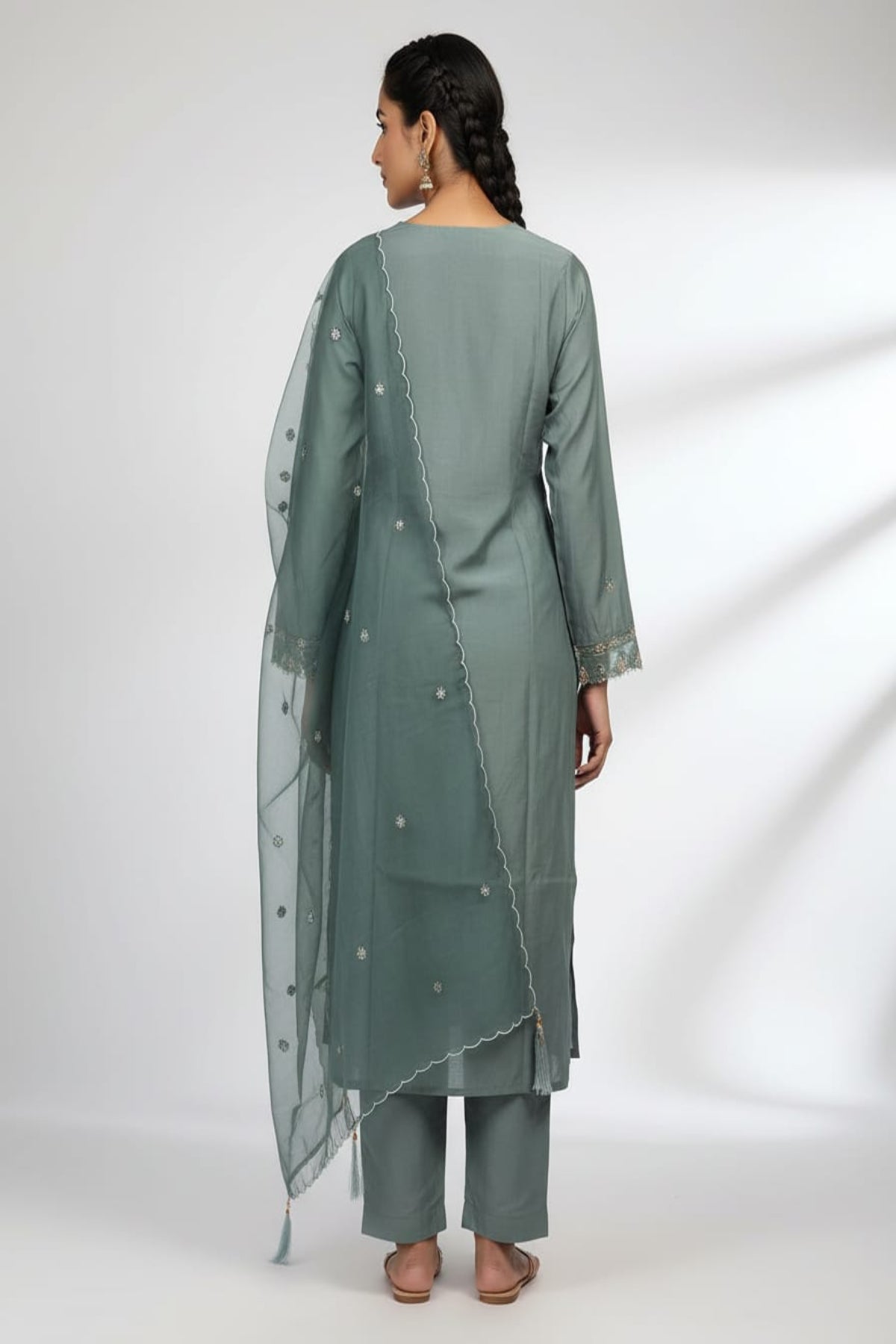 Teal green pintuck kurti with floral buttons & tread work